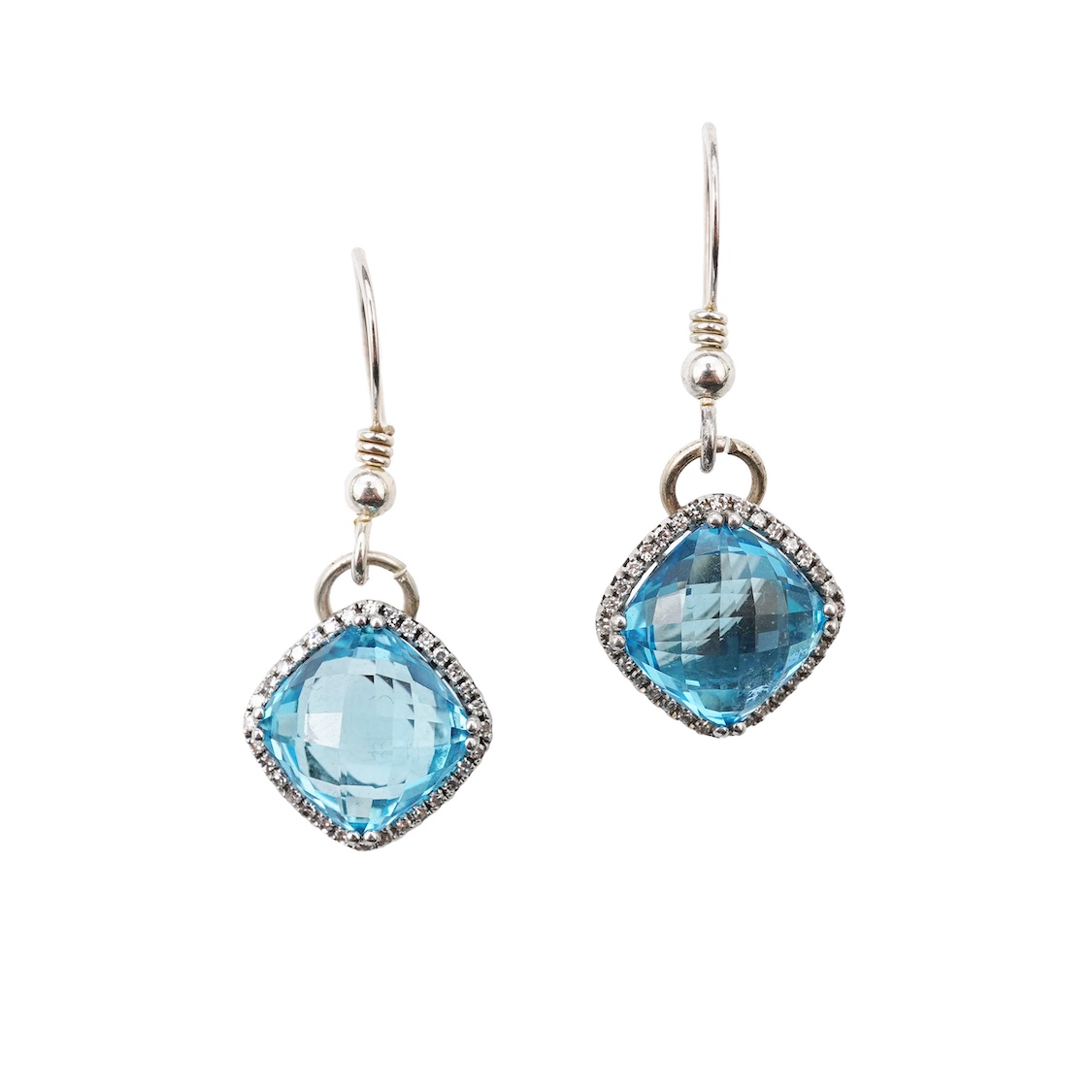 A pair of blue topaz and diamond pendant earrings